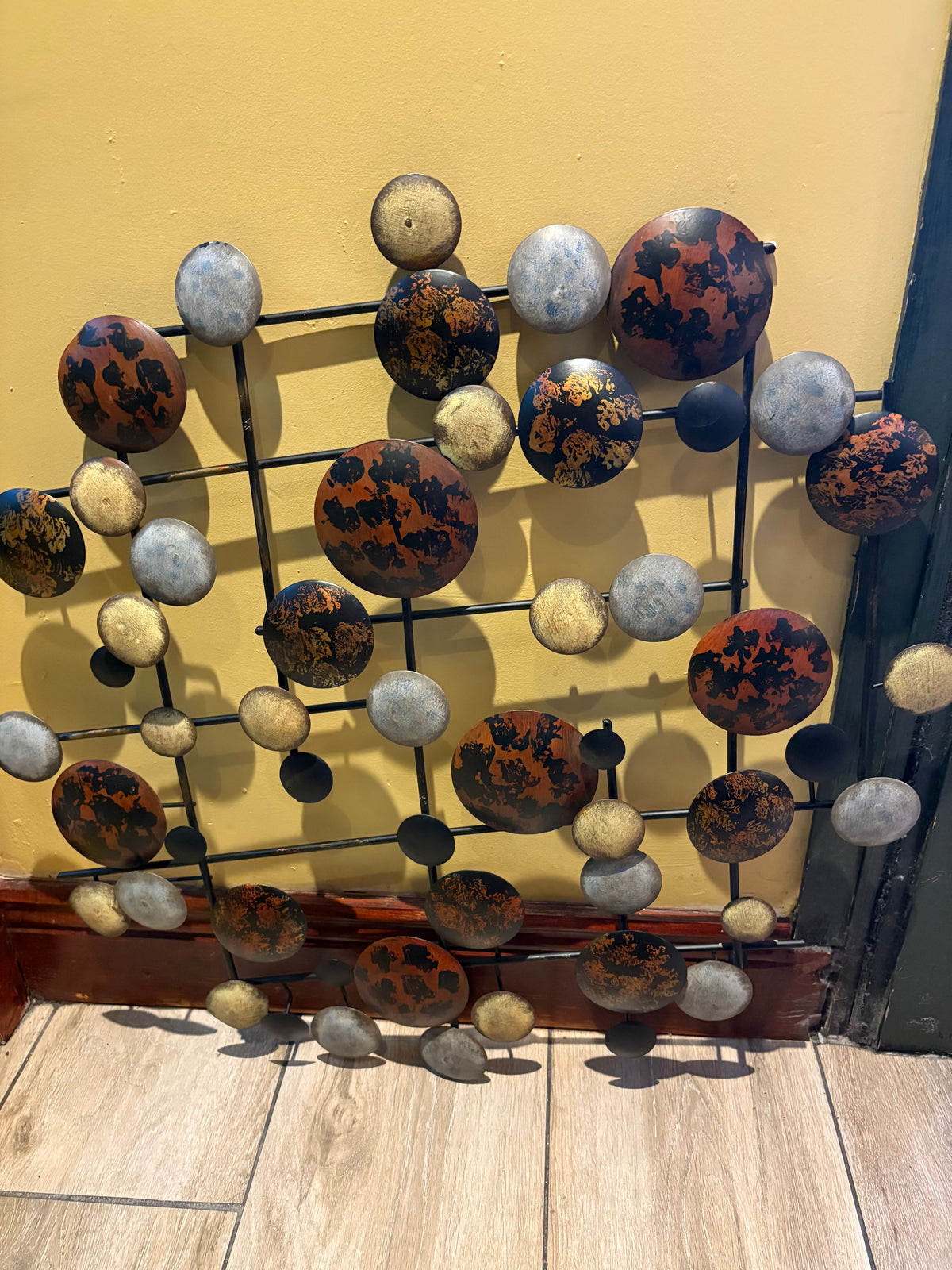 MID CENTURY MODERN BRUTALIST METAL WALL SCULPTURE WITH CIRCULAR MOTIFS