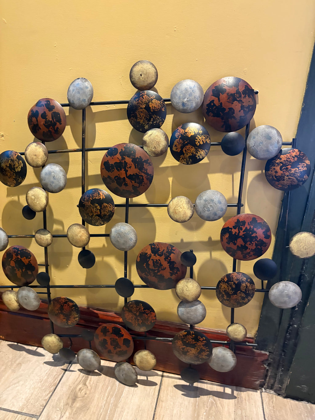 MID CENTURY MODERN BRUTALIST METAL WALL SCULPTURE WITH CIRCULAR MOTIFS
