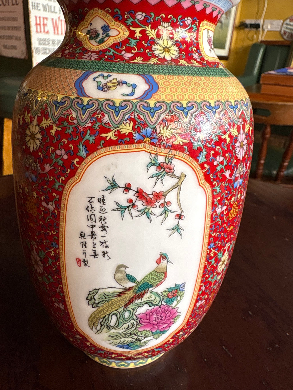 Porcelain vase panel depicting long-tailed birds, blossoms and calligraphy within a gold-coloured border