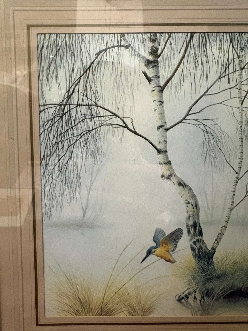 Detail of the kingfisher artwork showing drooping birch branches, pale water and reeds.