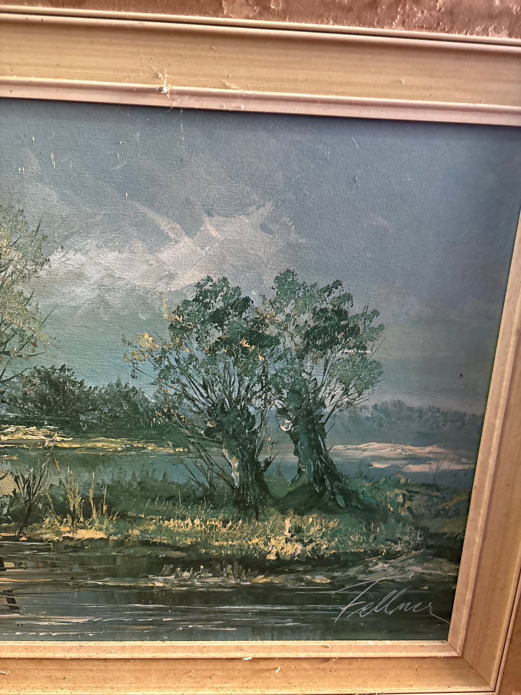 Lower-right landscape detail showing riverside trees and the Fellner signature.