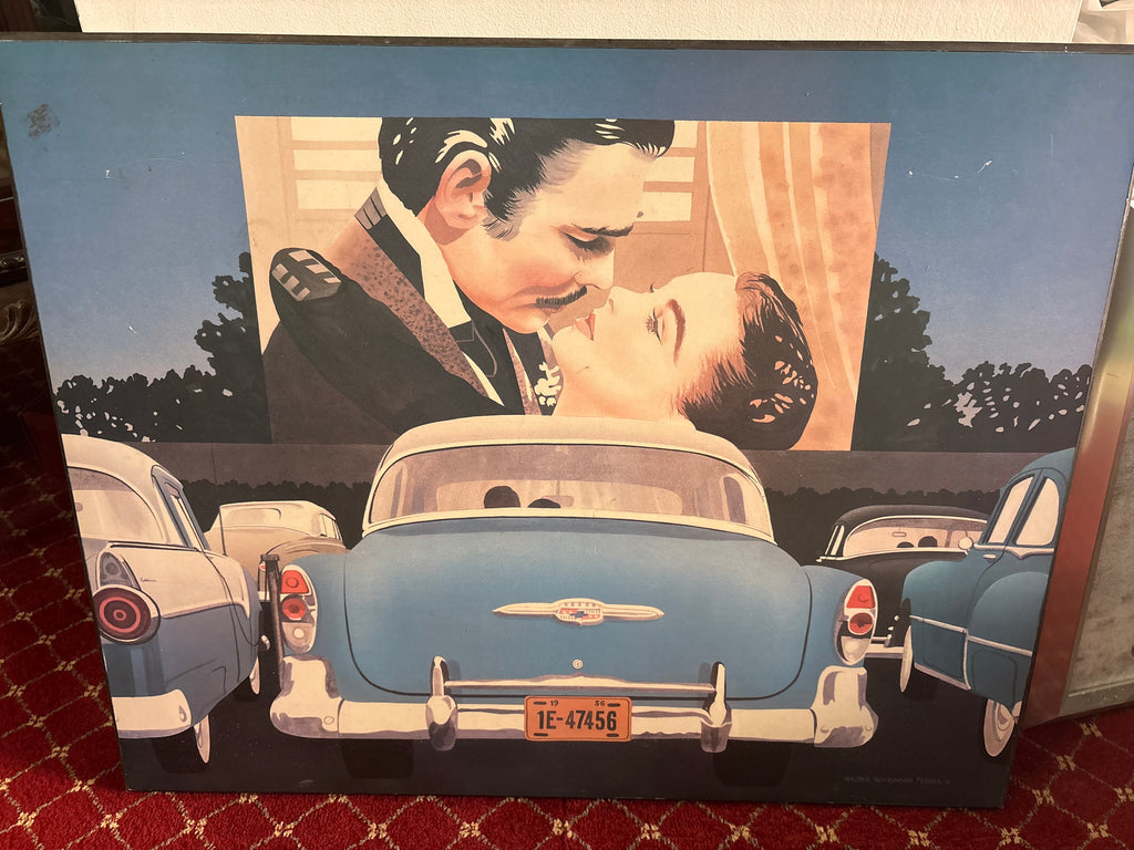 Drive-in cinema print showing classic cars facing a large screen with a romantic film scene.
