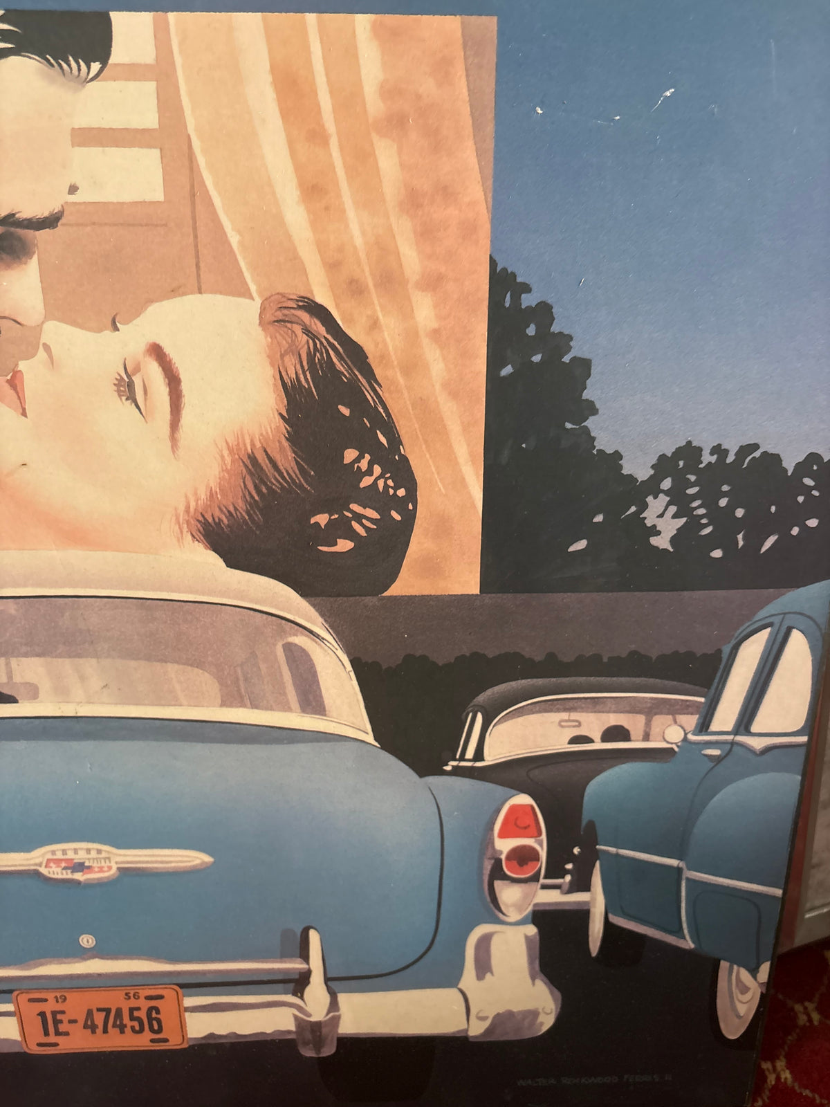 Right-side drive-in print detail showing blue cars and the woman on the cinema screen.
